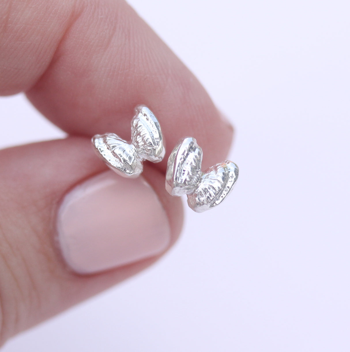 Butterfly shell studs