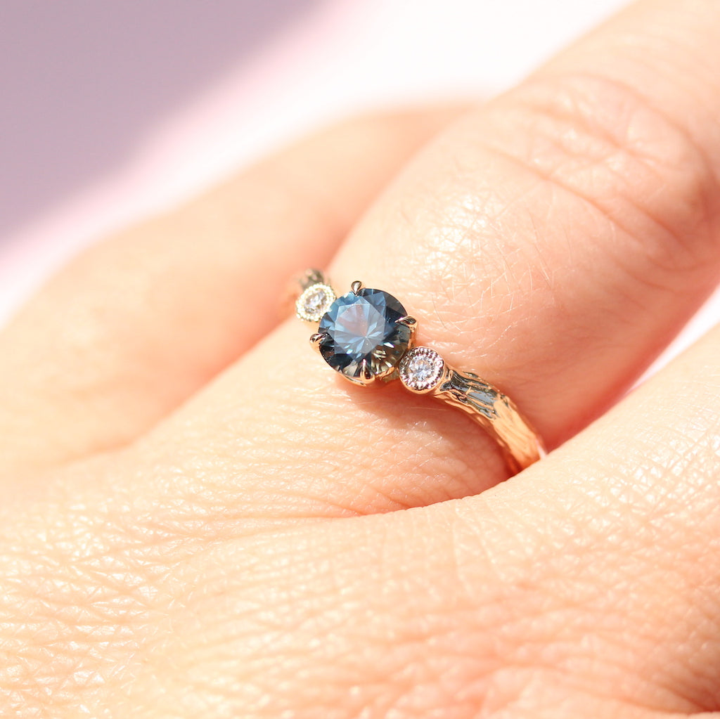 Sapphire ring on the finger