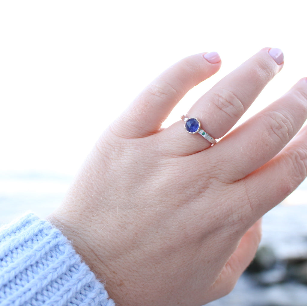 Sapphire and emerald two tone ring