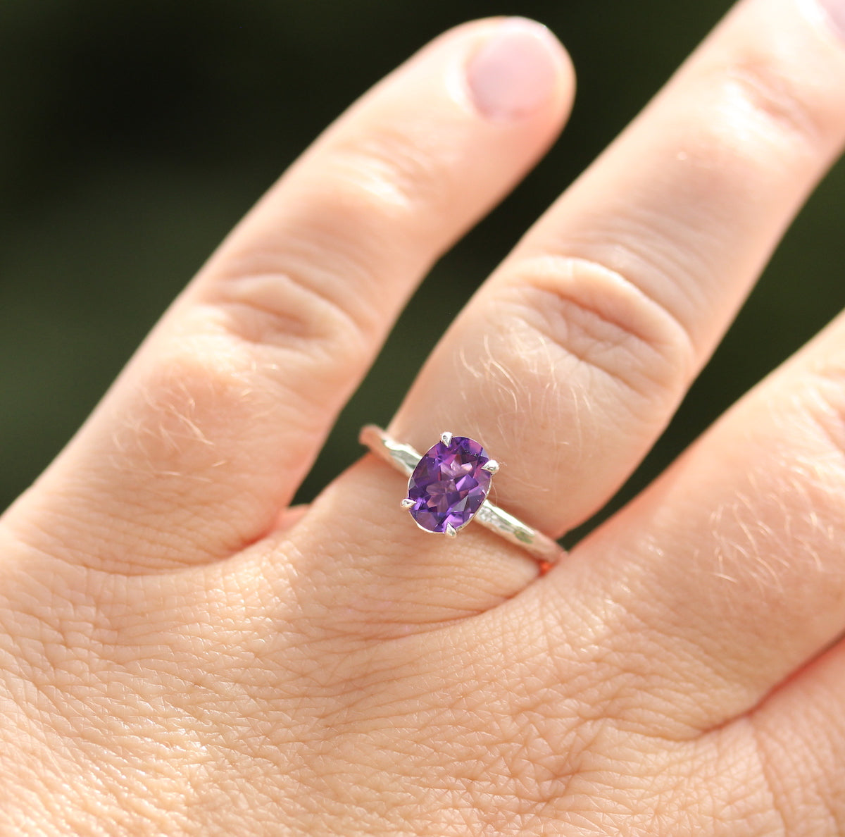 amethyst gemstone ring on hand by kathryn rebecca
