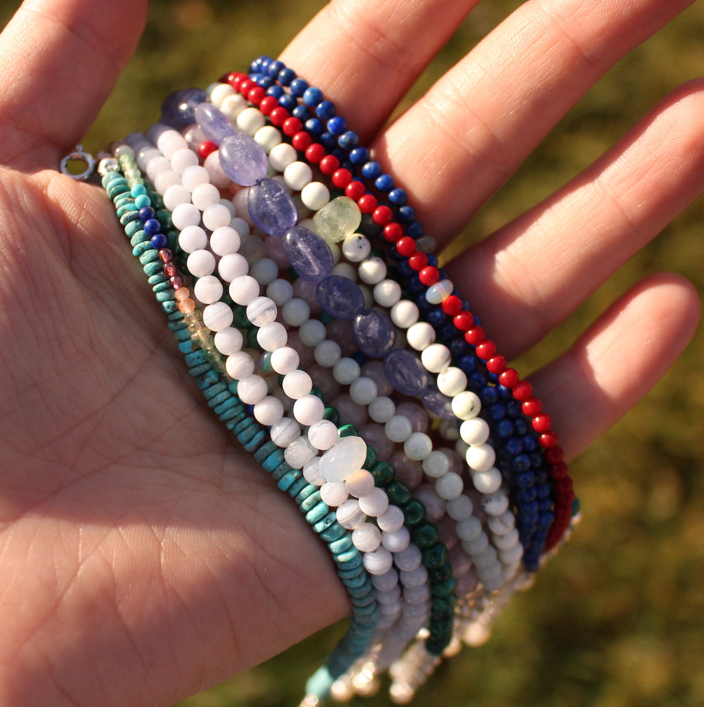 stackable bracelets in hand