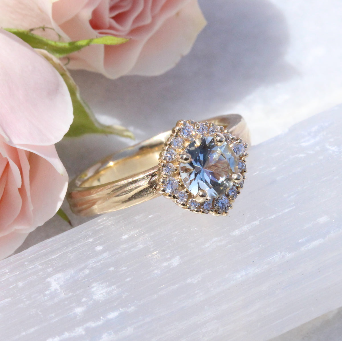 halo engagement ring with white sapphire