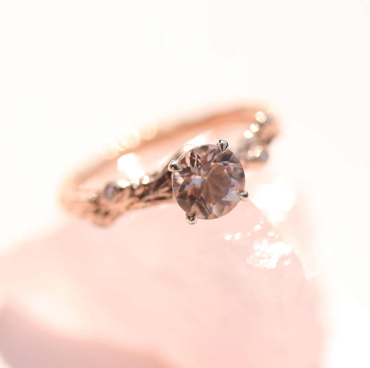 Rose gold branch ring with pink gemstone