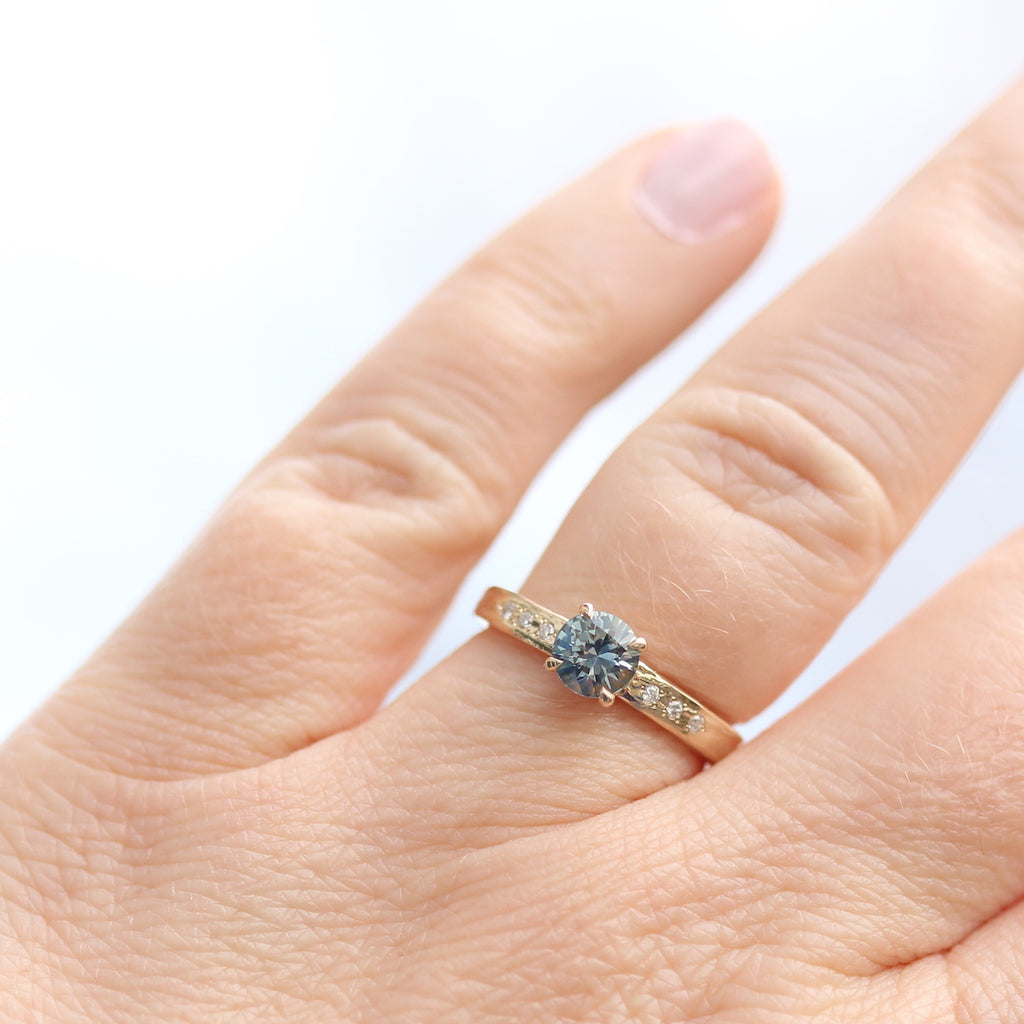 Yellow gold solitaire ring with blue sapphire 
