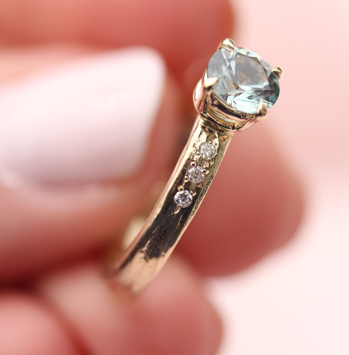 Teal sapphire ring designed and made by Kathryn Rebecca Jewelry