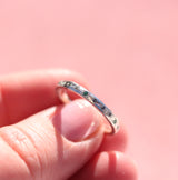 Water band in silver with teal sapphire and emerald