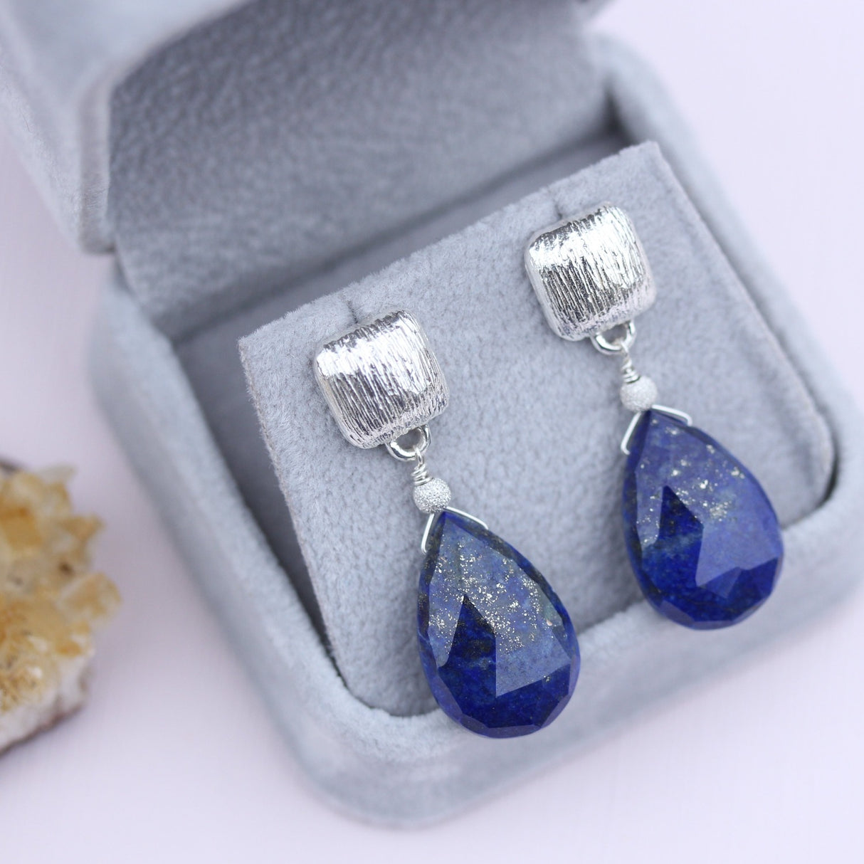 Large drop earring with gemstone