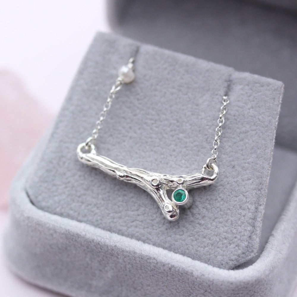 silver branch necklace with emerald