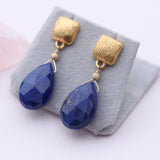 Large drop earring with gemstone
