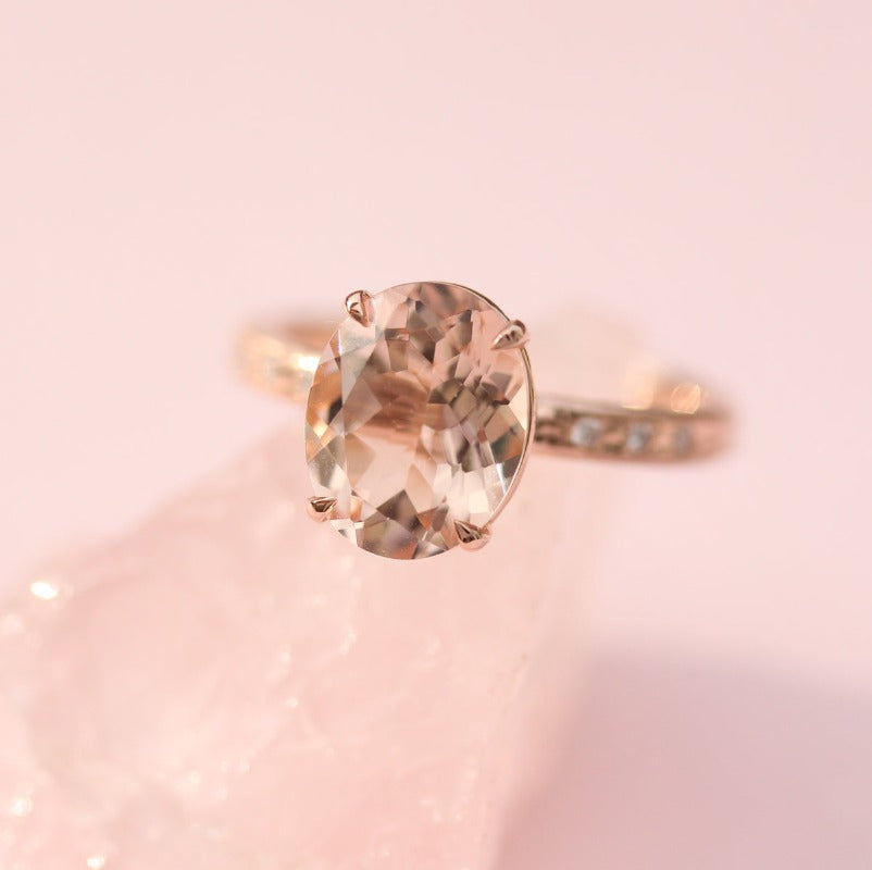 morganite oval gemstone and rose gold ring