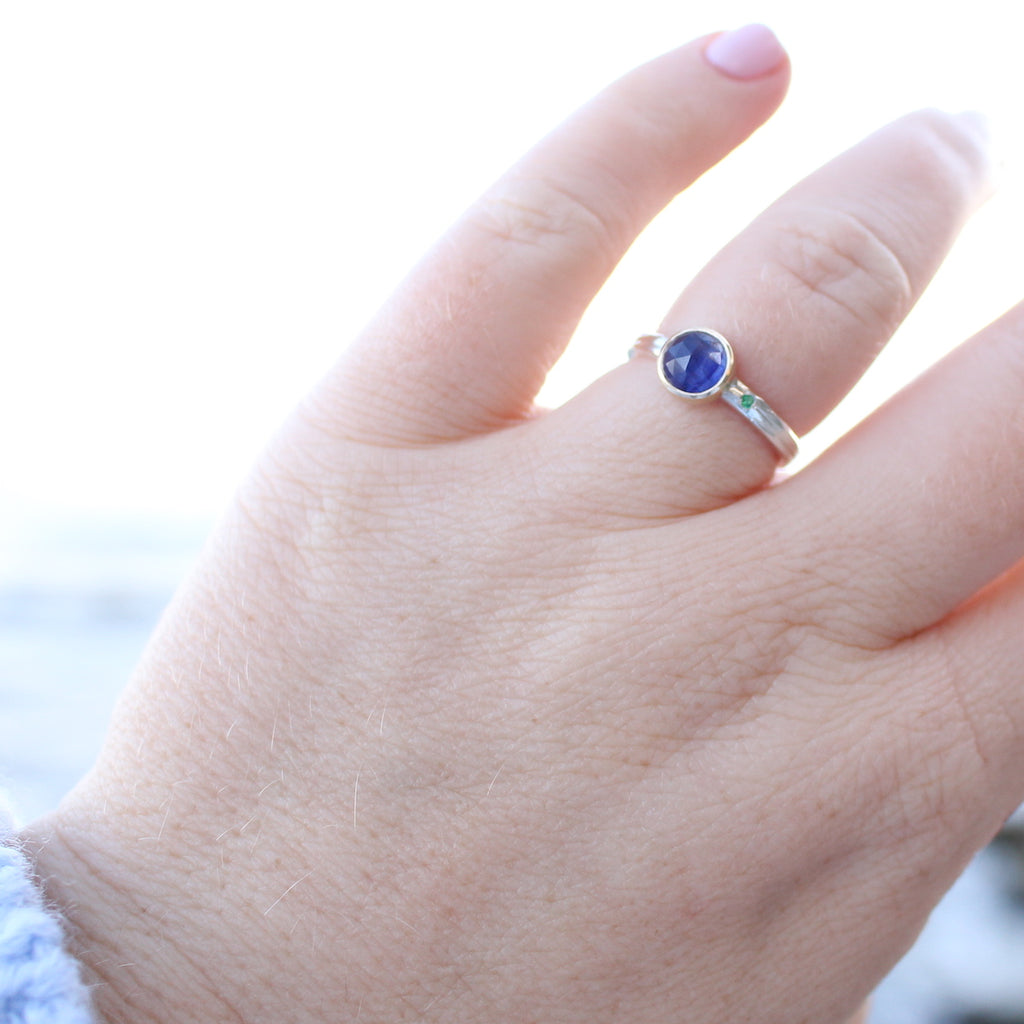 Sapphire and emerald two tone ring