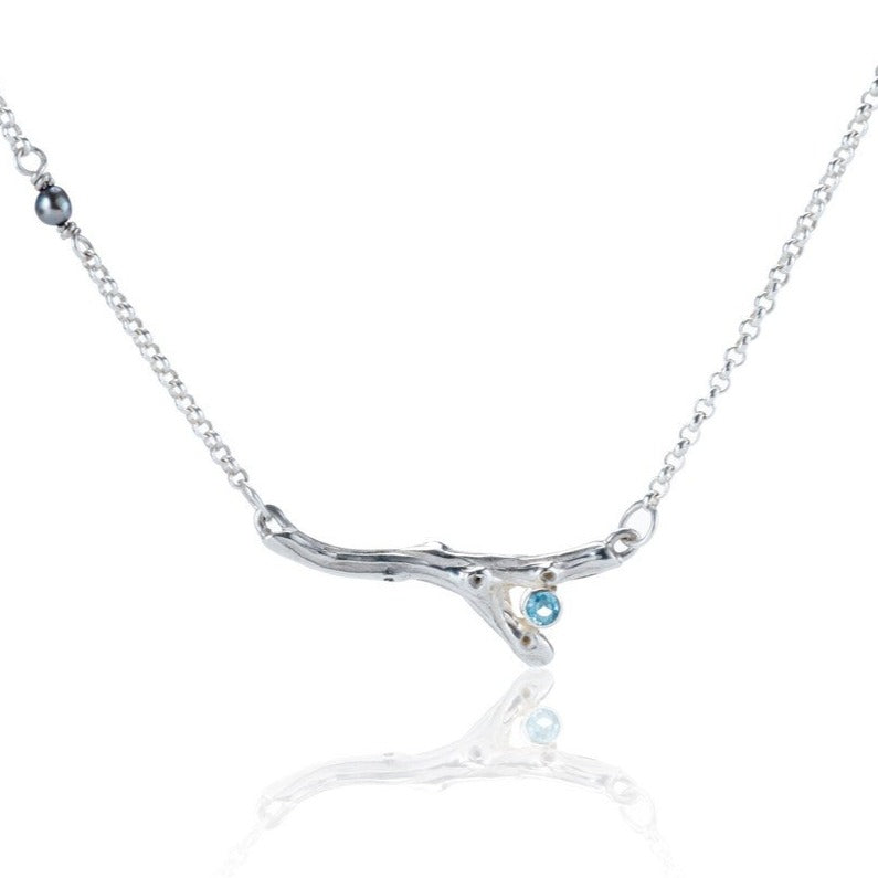 silver branch necklace with blue topaz