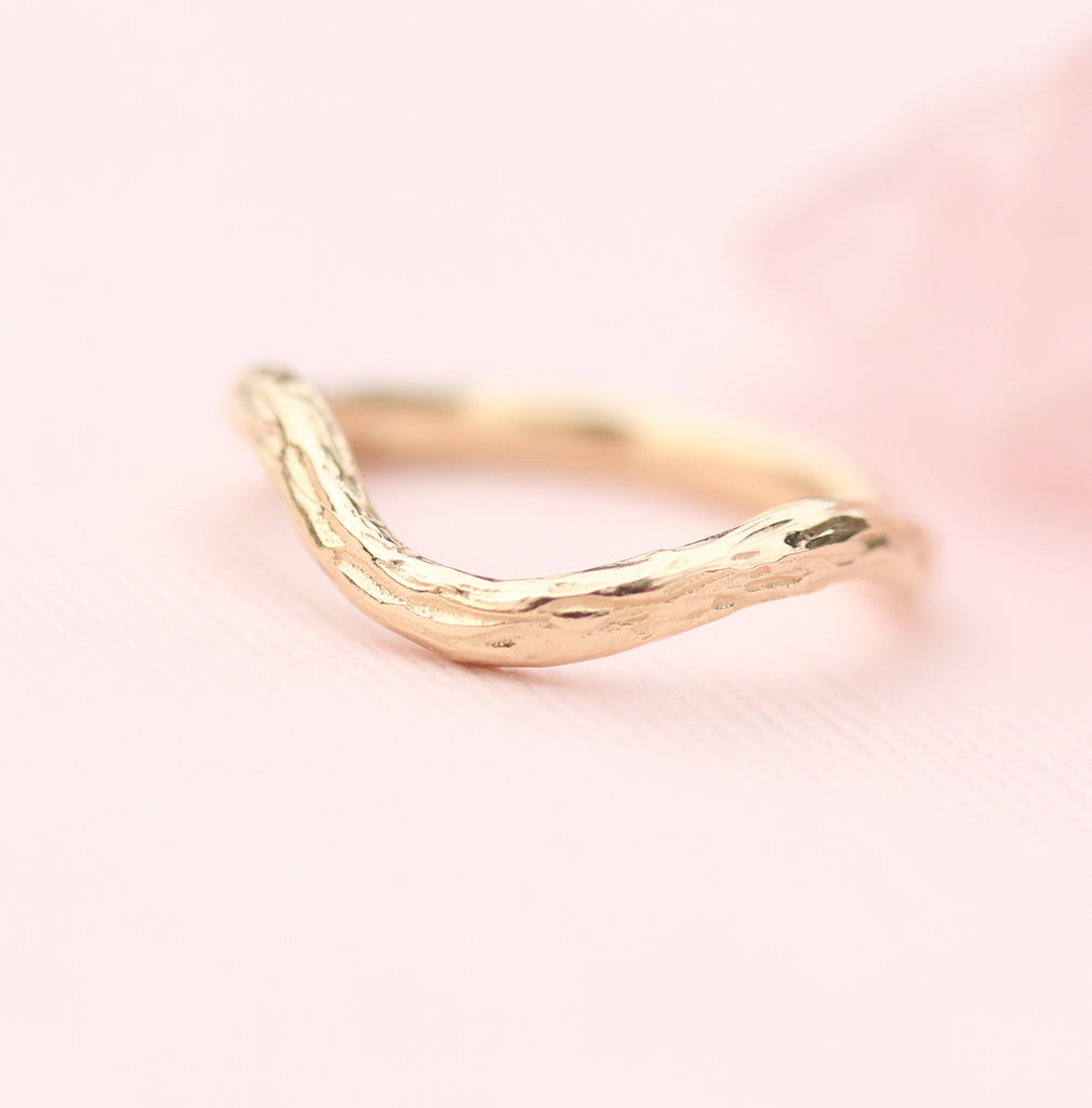contour wedding band with branch texture