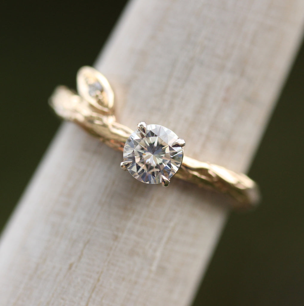 solitaire engagement ring with diamond and branch texture