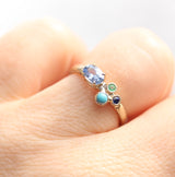 cluster ring with sapphire, turquoise and emerald