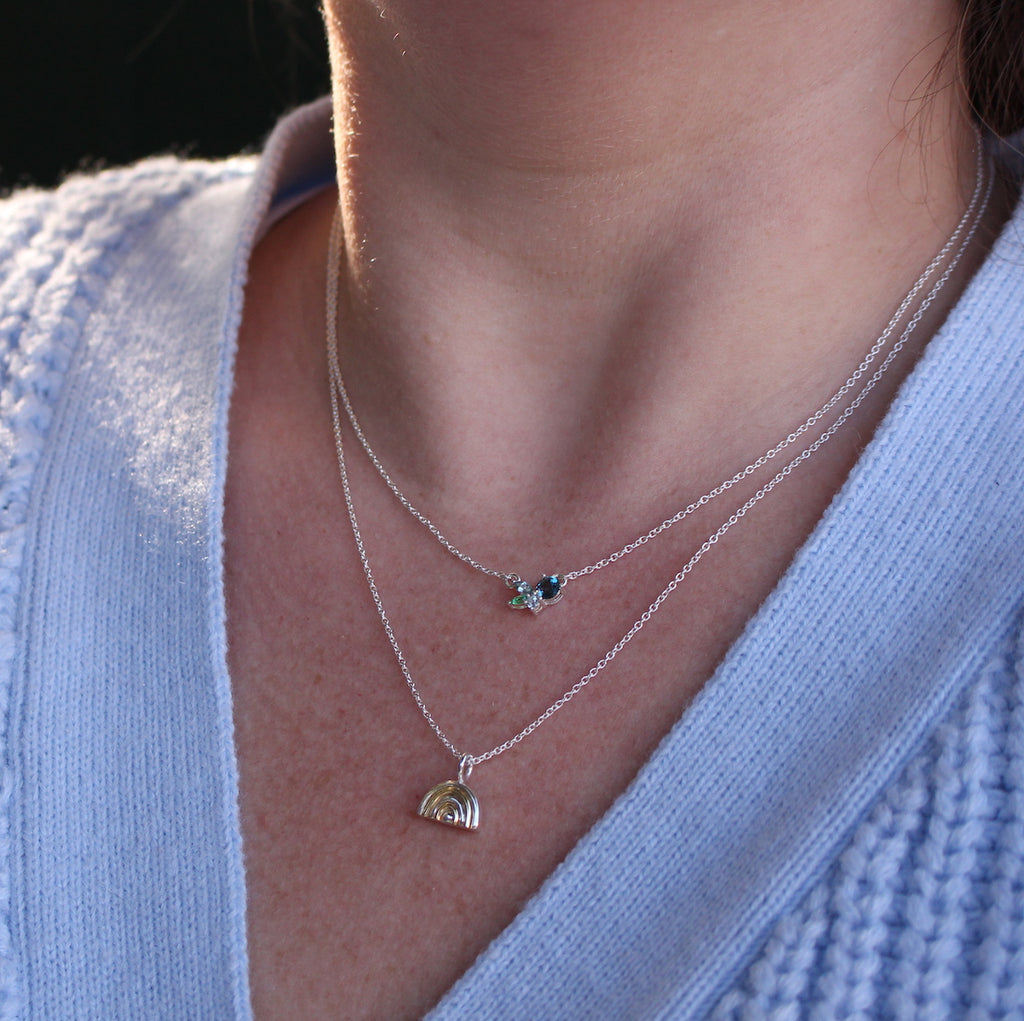 cluster gemstone necklace on neck