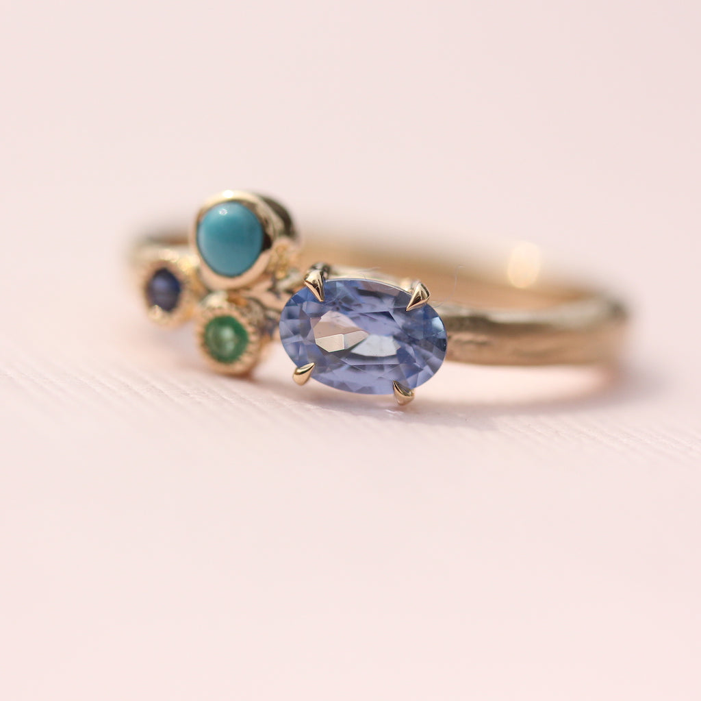 Cluster blue and green gemstone ring