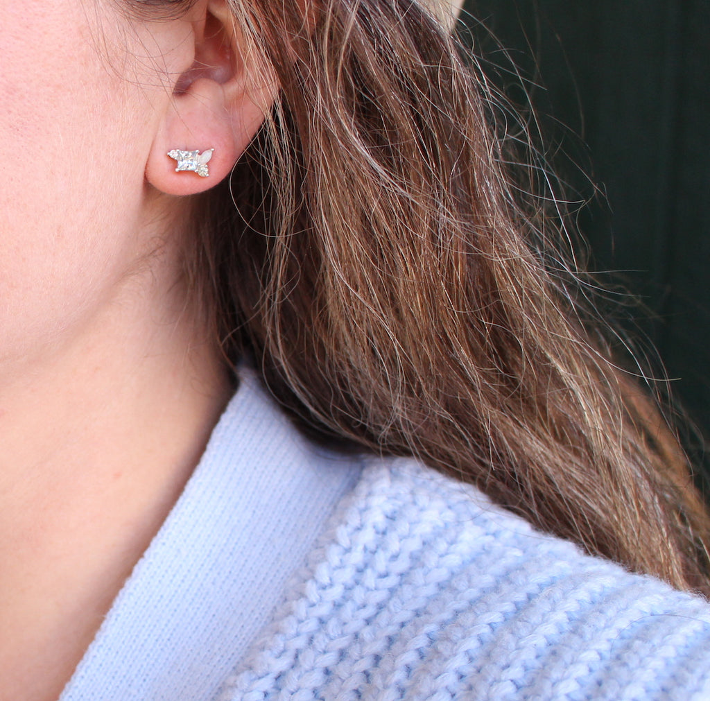 cluster gemstone studs on ear
