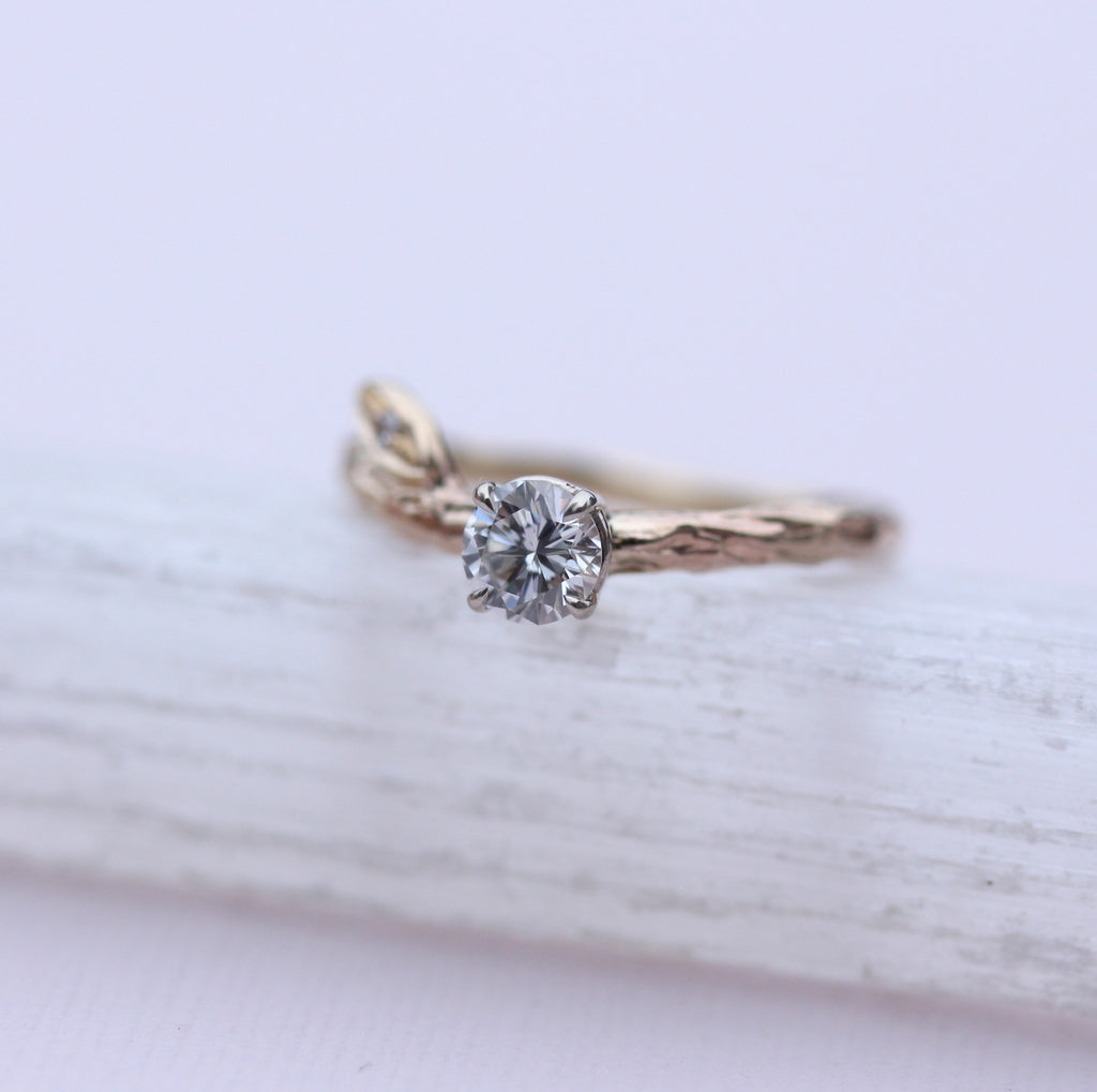 branch and leaf engagement ring with diamond