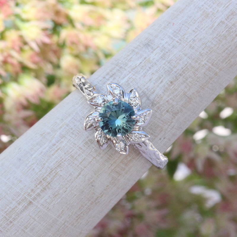 leaf halo with teal sapphire