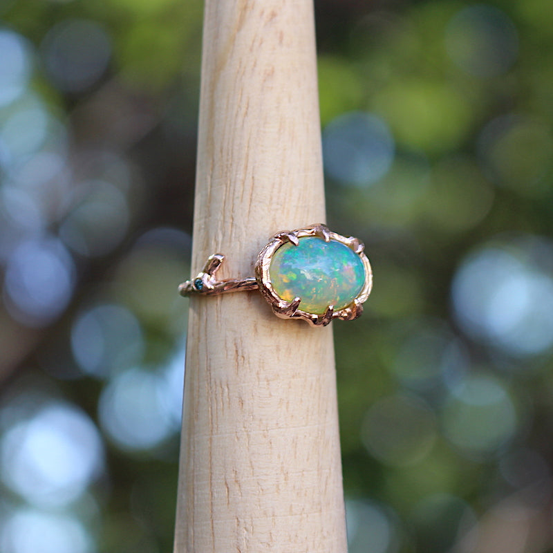 Opal and rose gold ring
