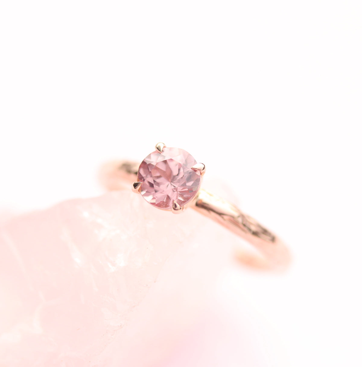 pink garnet solitaire on pink quartz