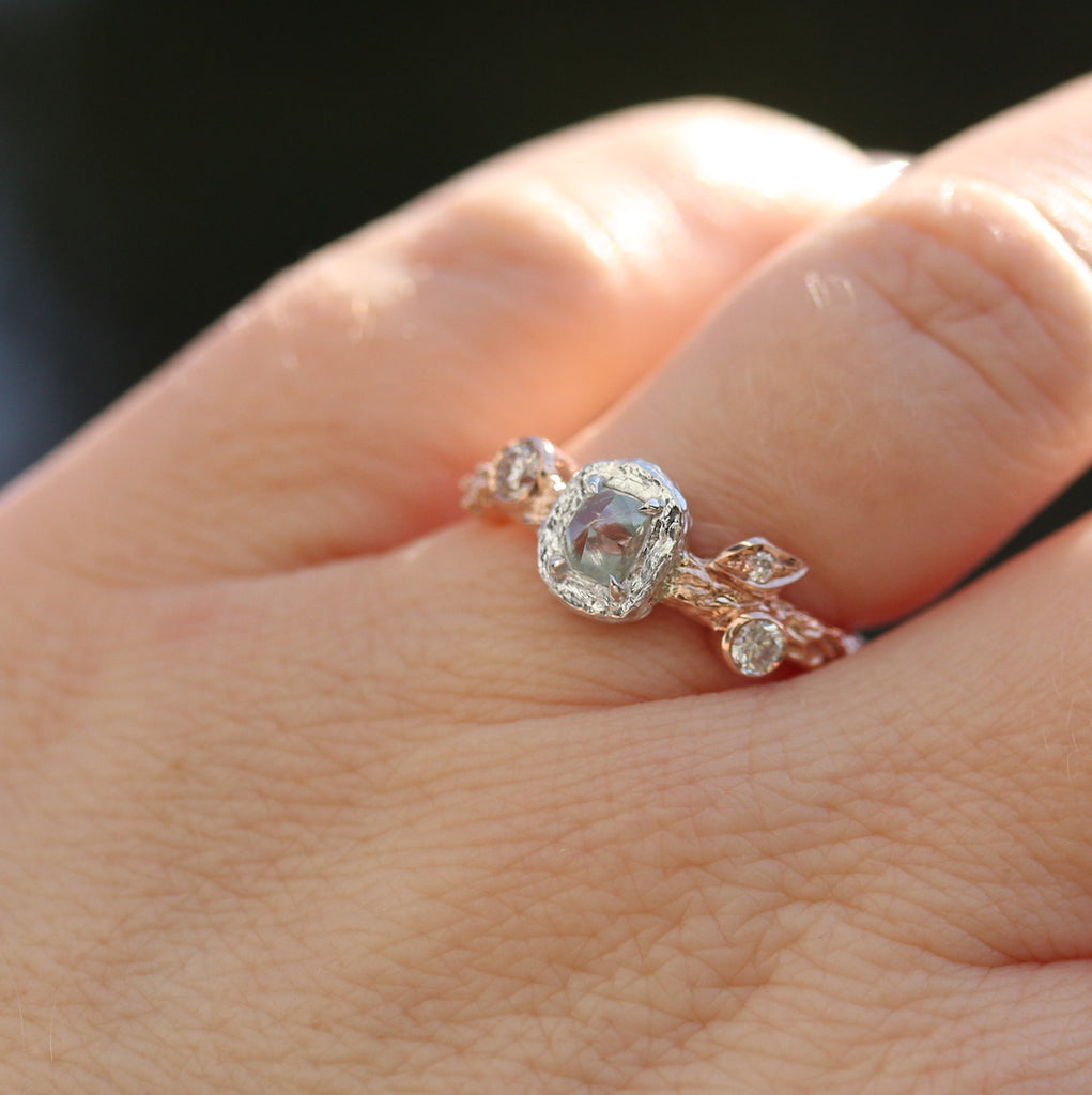 Rough diamond ring on the hand