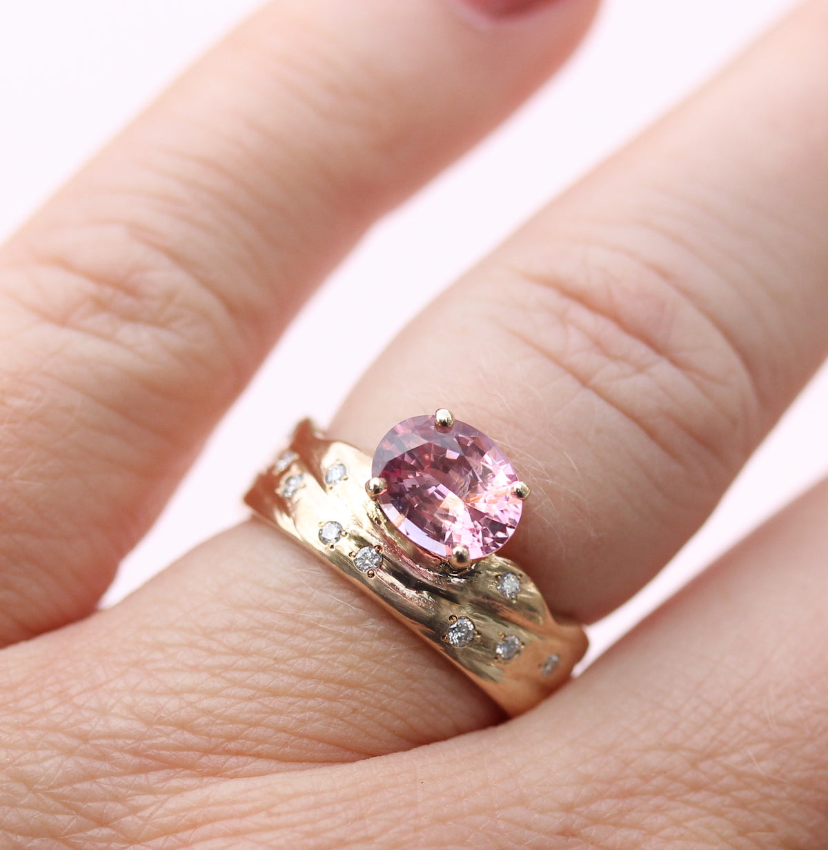 sunset ring on the finger